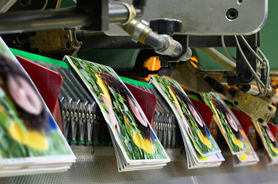 Saddle stitch machine